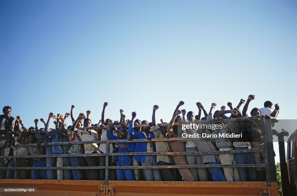 Africa, Namibia, people travelling on truck to vote