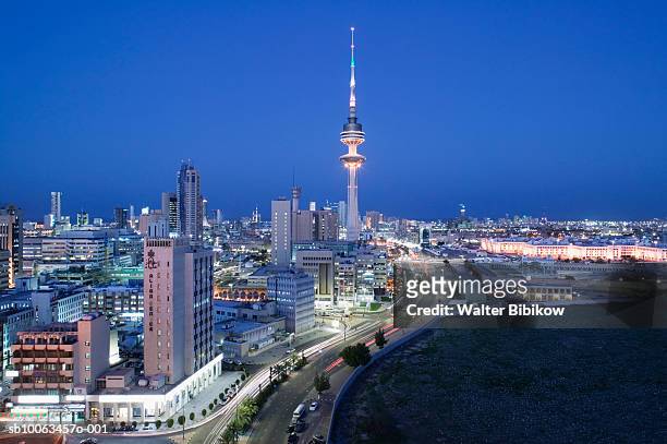 kuwait, kuwait city, cityscape at dusk - kuwaiti stock pictures, royalty-free photos & images