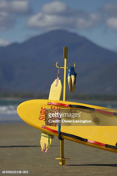 surf lifesaving equipment, four mile beach, port douglas, queensland, australia - port douglas stock pictures, royalty-free photos & images