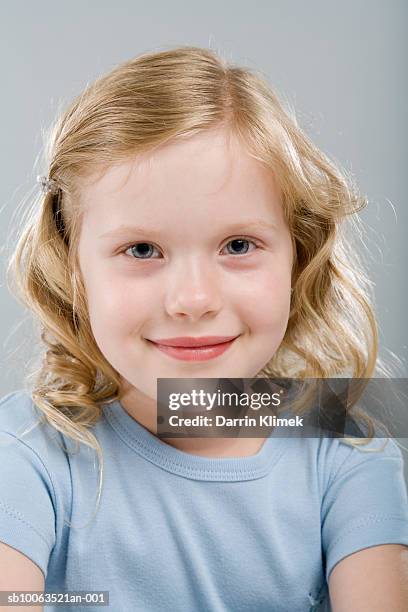 Girl Smiling Portrait High-Res Stock Photo - Getty Images