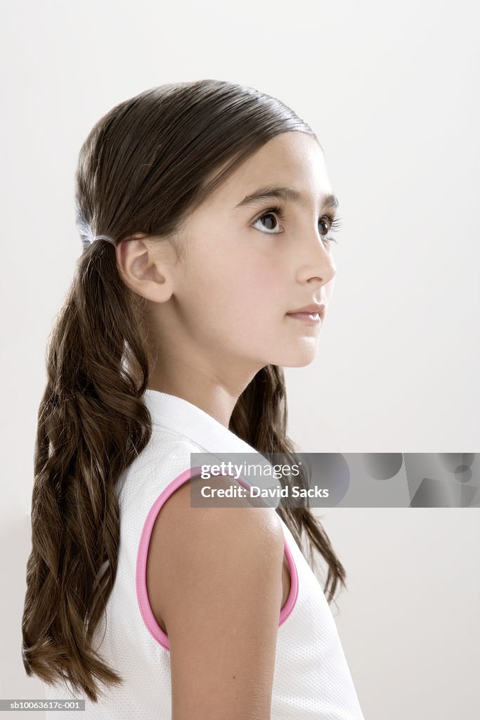 Girl (8-9) looking up