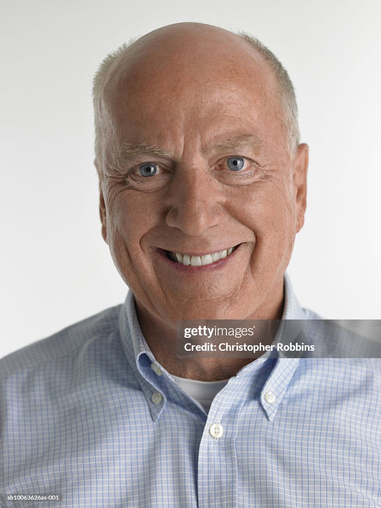 Senior man smiling, portrait