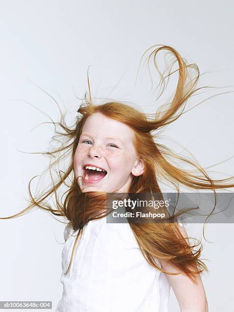 girl (8-9) head banging, mouth open - headbanging stock pictures, royalty-free photos & images