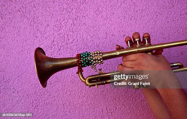 person playing trumpet, close-up of hands - new orleans music stock pictures, royalty-free photos & images