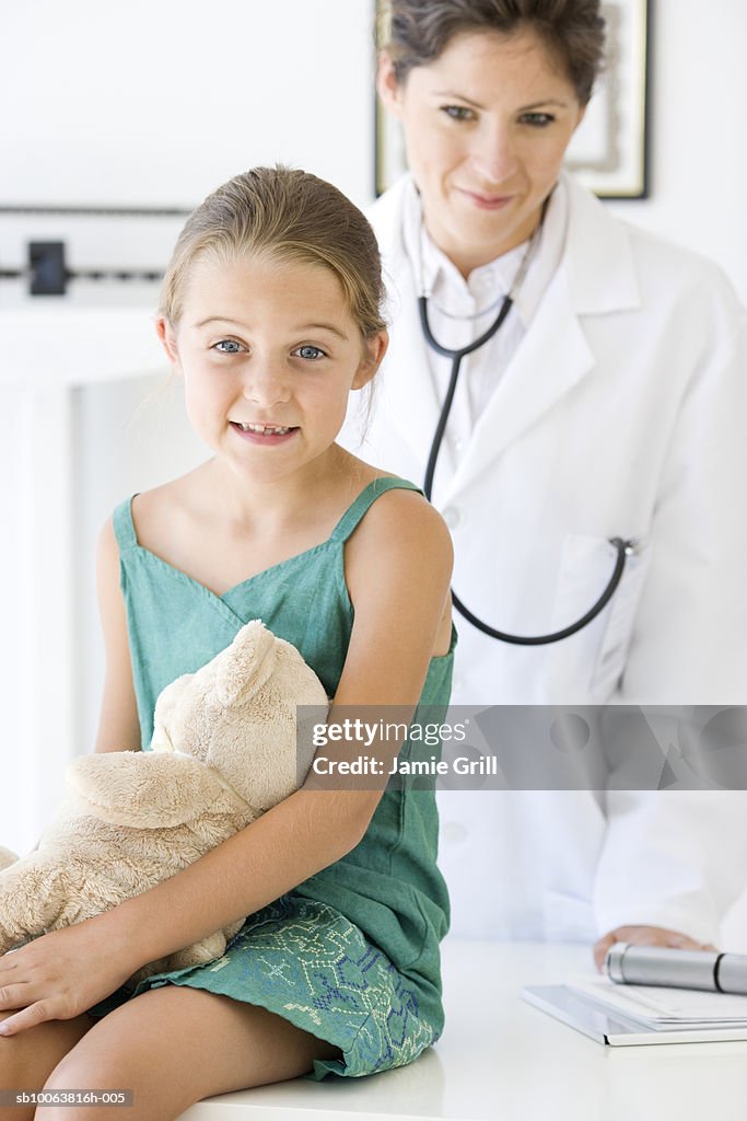 Paediatrician with girl (6-7)