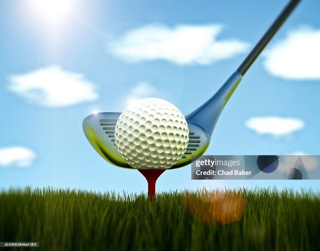 Golf ball on tee with club, close-up (Digitally Generated)