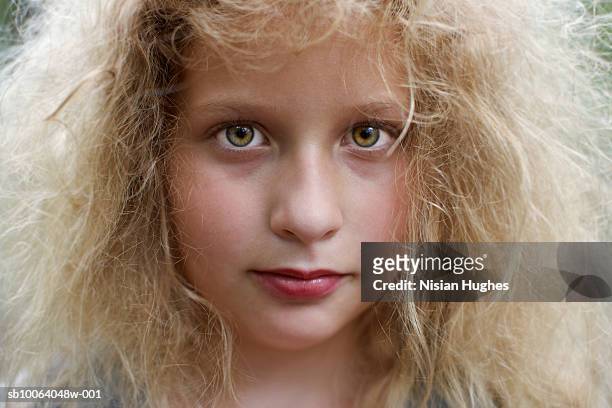 girl (8-9) with make-up, smiling, portrait, close-up - frizzy fotografías e imágenes de stock