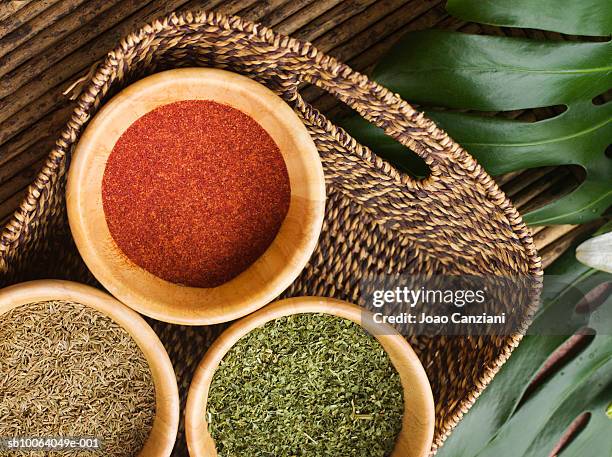 spices in basket on table outdoors, overhead view - seasoning - fotografias e filmes do acervo