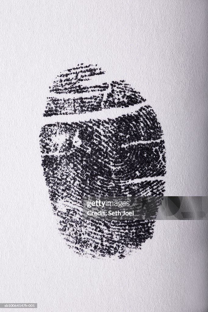 Fingerprint on white paper