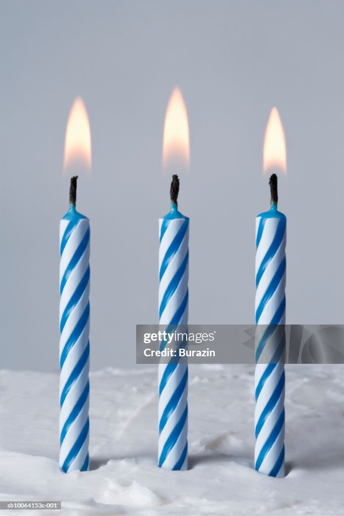 Blue candles on cake, close-up