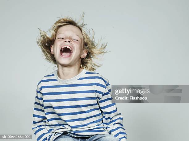 boy (8-9) laughing, mouth open, close-up - kids laughing close up bildbanksfoton och bilder