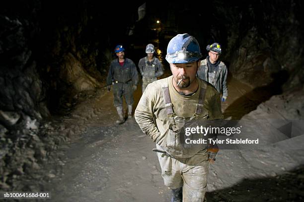 mining workers walking in marble quarry - miner stock pictures, royalty-free photos & images