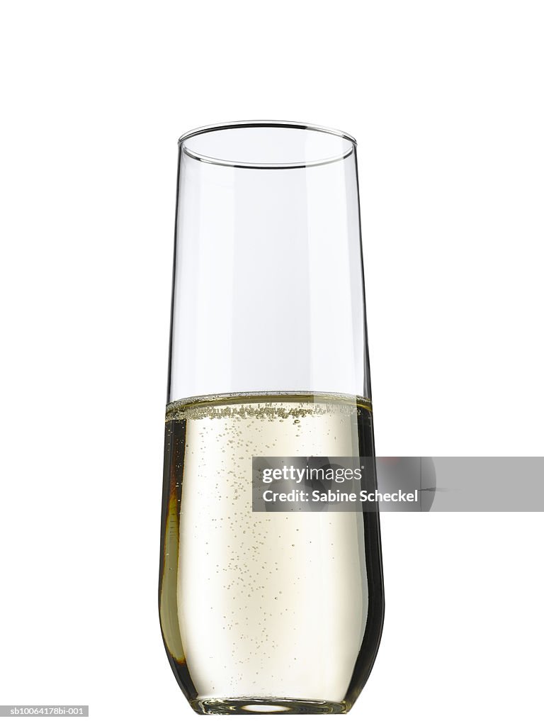 Stemless flute with champagne on white background