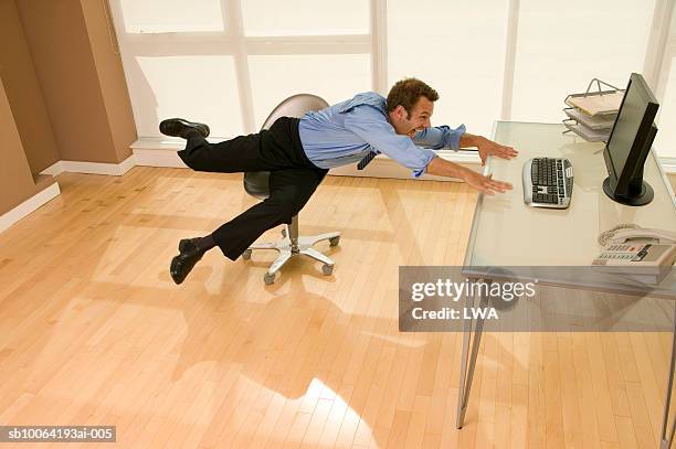 Falling Into Chair Photos and Premium High Res Pictures - Getty Images