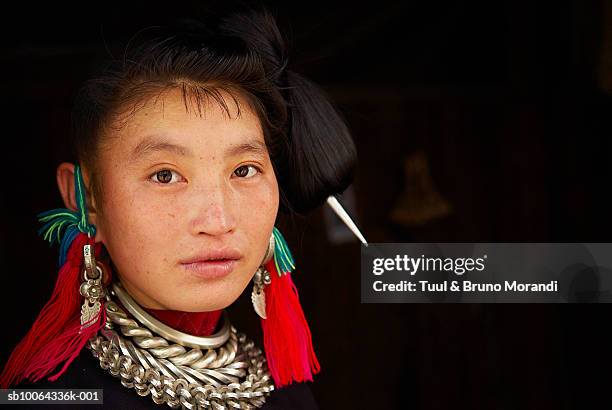 portrait of young  black miao woman in traditional costume - chinese collar stockfoto's en -beelden