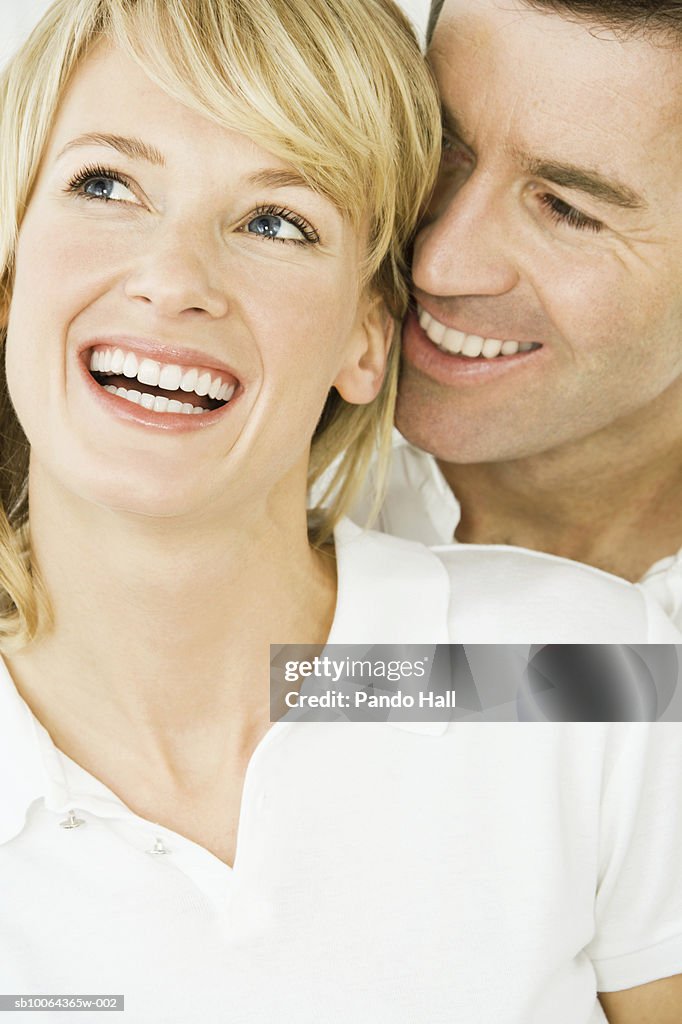 Couple smiling, close-up