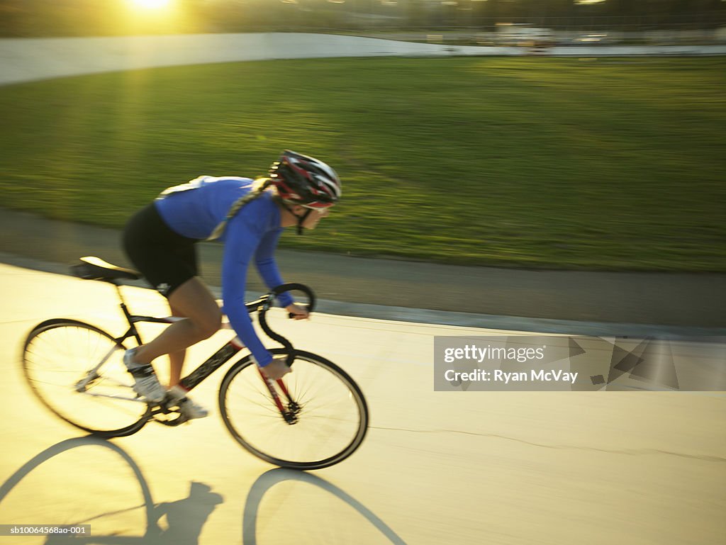 Cyclist in action on velodrome track