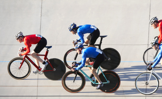 Cyclists racing, side view
