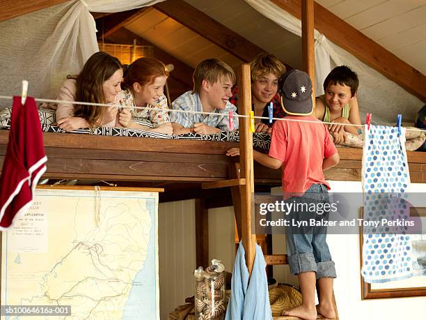 group of children (7-13) on bunk bed - kids in bunk bed stock pictures, royalty-free photos & images