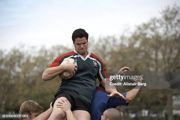 Leaping Trys Rugby 367 Rugby Player Leaping Up To Catch Ball Stock Photos, High-Res ...