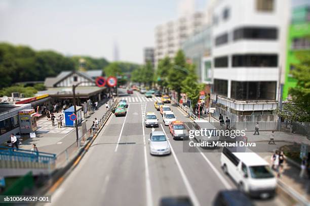 traffic on highway - tilt shift stock pictures, royalty-free photos & images