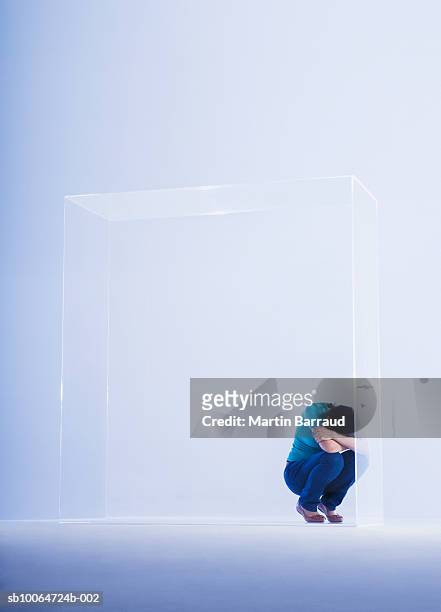 woman trapped in glass cabinet - glass box stock pictures, royalty-free photos & images
