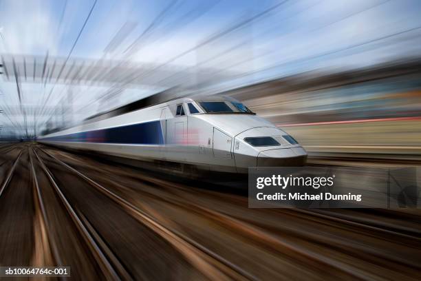 tgv train at speed (blurred motion) - high speed train stock pictures, royalty-free photos & images