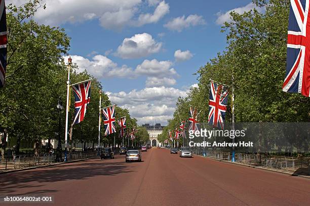 uk, london, union jack flags in street - union jack car stock pictures, royalty-free photos & images