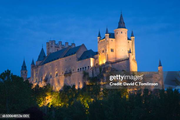 segovia castle and cathedral at dusk - segovia stock pictures, royalty-free photos & images
