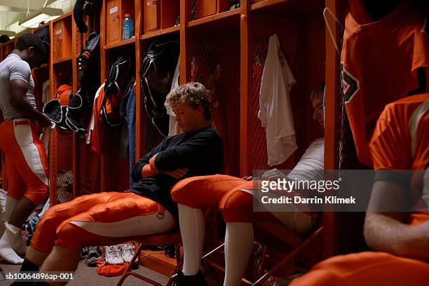 american football players (15-17) in locker room - locker room bildbanksfoton och bilder