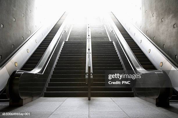stairs and escalators with bright sunlight on top - stairway to heaven stock pictures, royalty-free photos & images