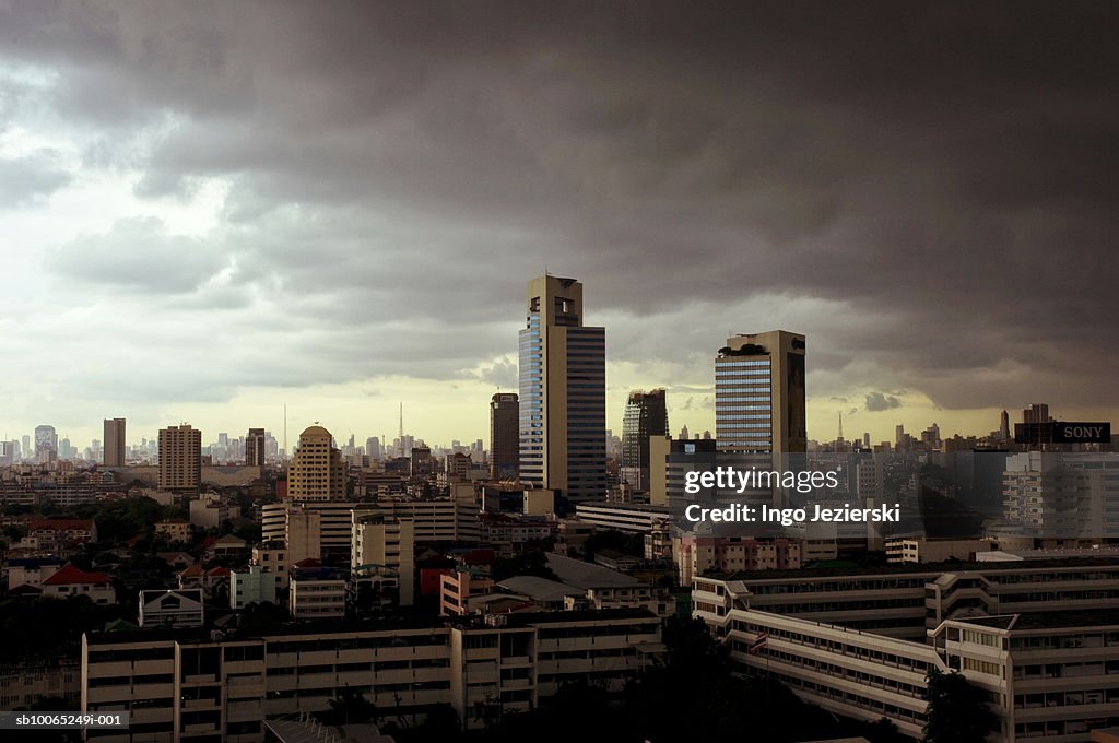 Thailand, Bangkok, Lad Phrao, monsoon clouds moving over office buildings