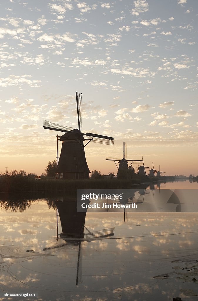 Windmills of Kinderdijk, built in 1740 to drain the low catch-water basin located between the path and the mills,Holland