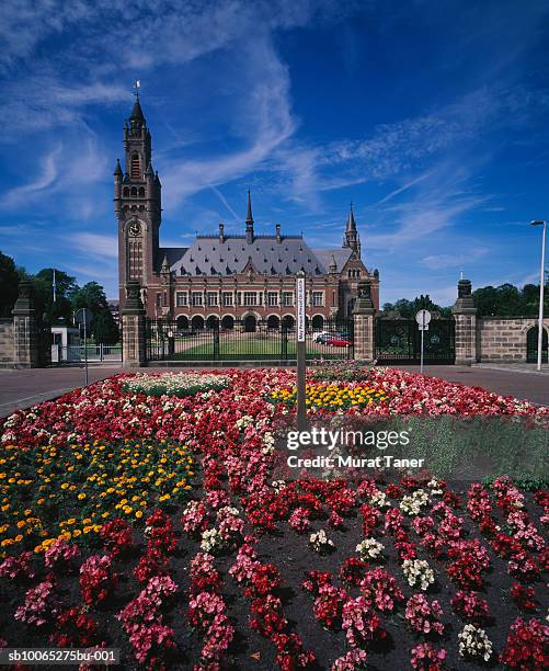 peace palace, international court of justice - peace palace the hague stock pictures, royalty-free photos & images