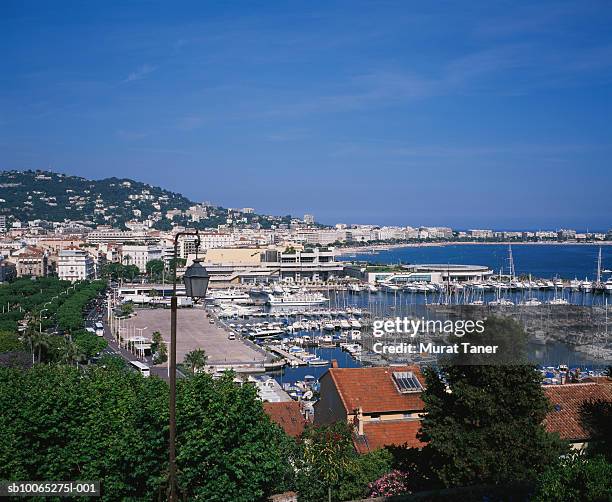 skyline view of cannes and harbor, elevated view - cannes skyline stock pictures, royalty-free photos & images