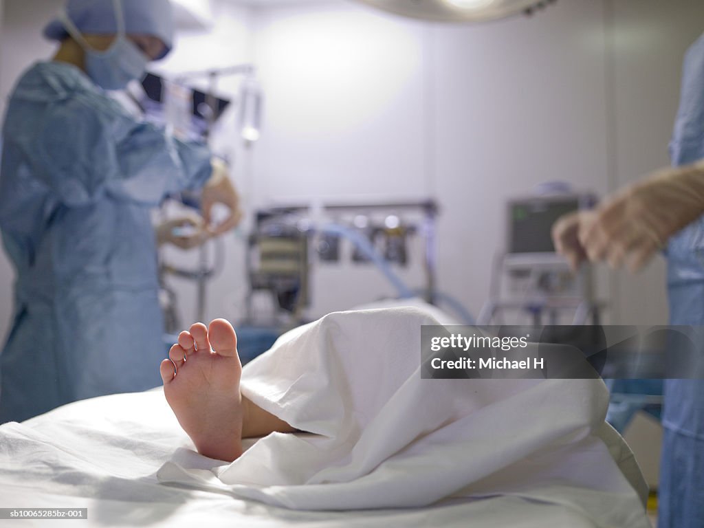 Patient's foot on operating table in surgery