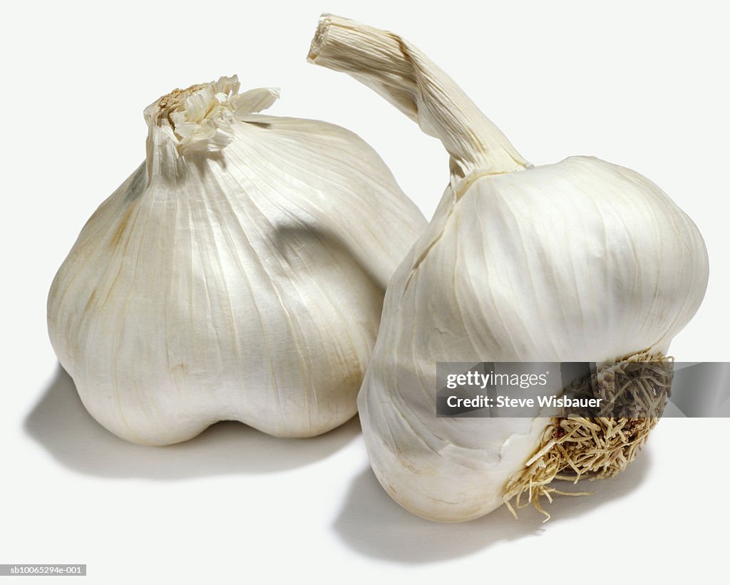 Two heads of garlic, studio shot, close-up
