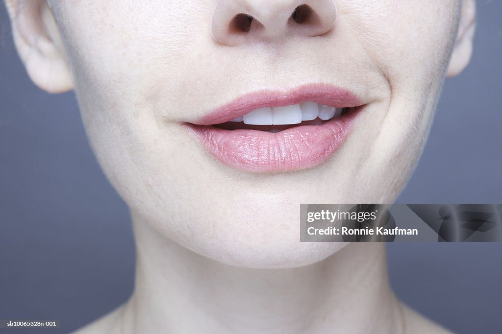 Woman smiling, close-up