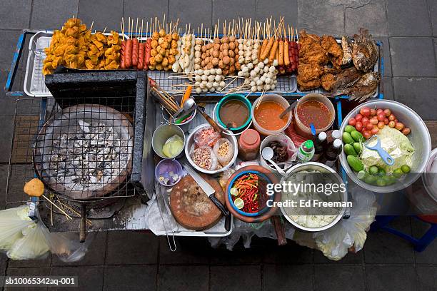 street food stall in silom, elevated view - street food stock pictures, royalty-free photos & images