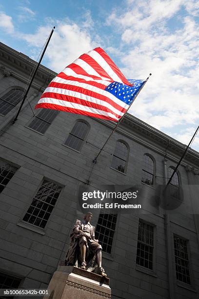 statue of john harvard in harvard yard, low angle view - harvard universität stock-fotos und bilder