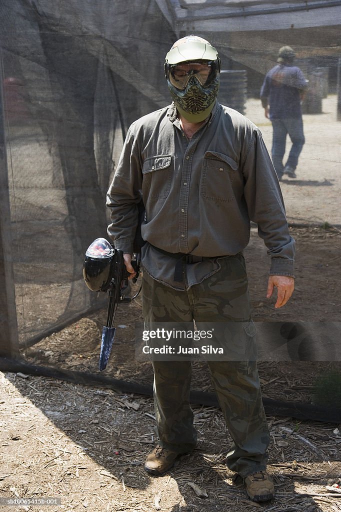 Man with paintball gear, portrait