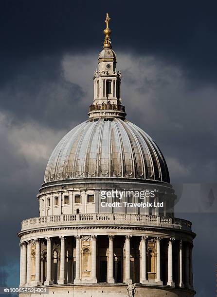 uk, london, dome of st paul's cathedral against stormy sky - st pauls cathedral bildbanksfoton och bilder