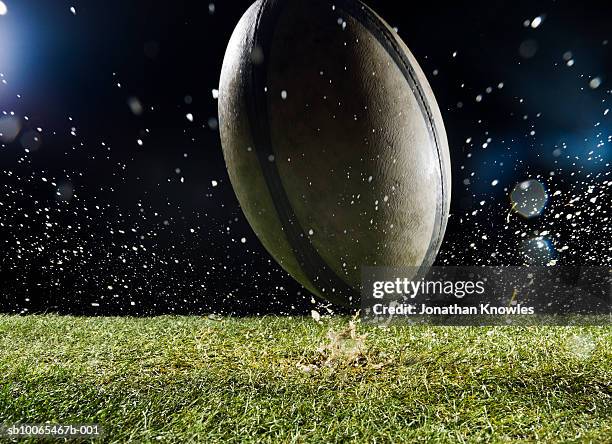 football on grass - ラグビーボール ストックフォトと画像