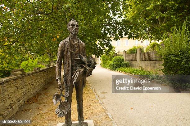 france, provence, st remy de provence, bronze statue of vincent van gogh - vincent van gogh painter stock pictures, royalty-free photos & images