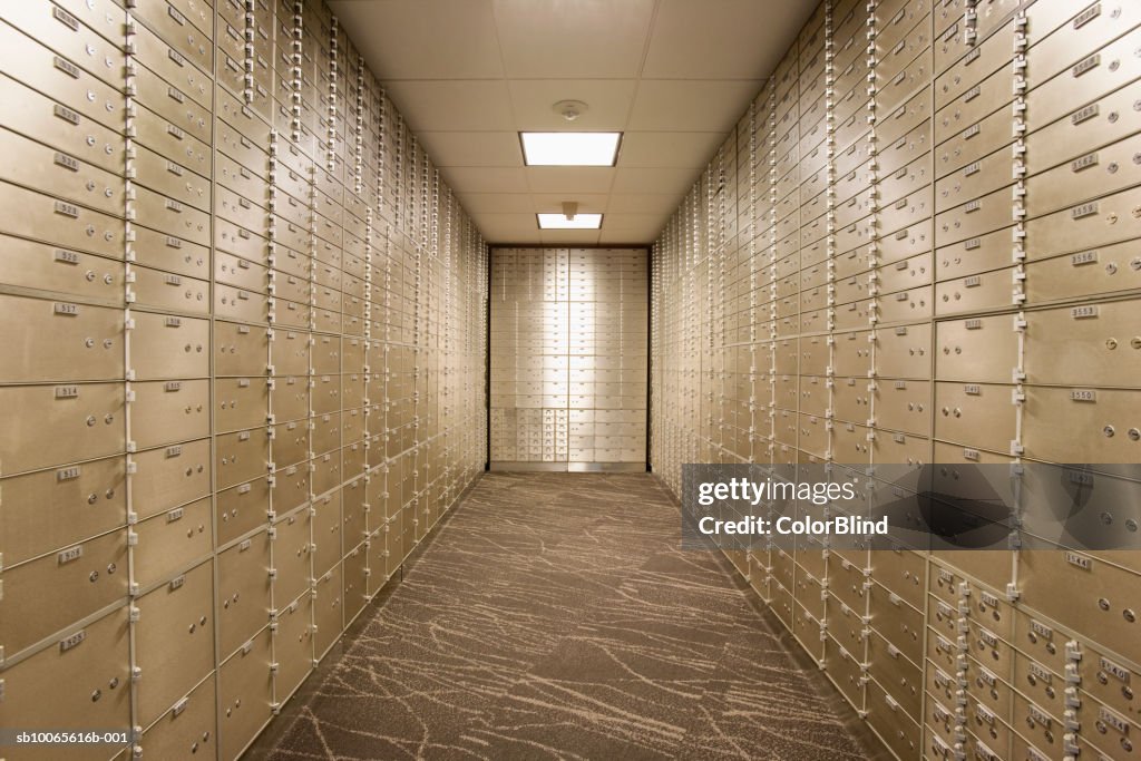 Empty bank vault with safety deposit boxes