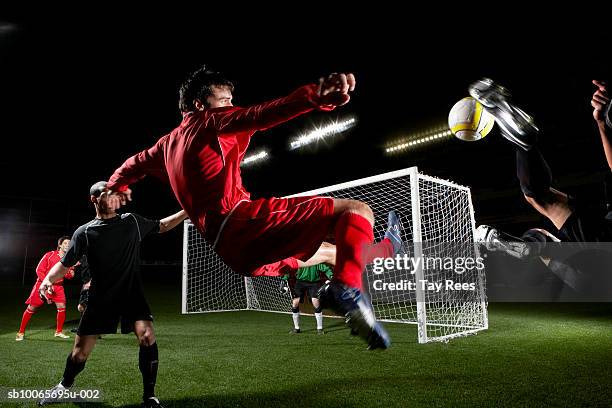 soccer match in stadium at night - soccer goal stock pictures, royalty-free photos & images