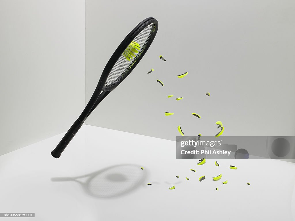 Tennis Ball Exploding On Racket White Background High-Res Stock Photo ...