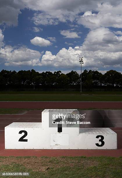 winners podium on track - winners podium stock pictures, royalty-free photos & images