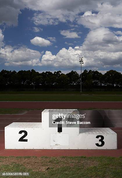 winners podium on track - winners podium numbers stock pictures, royalty-free photos & images