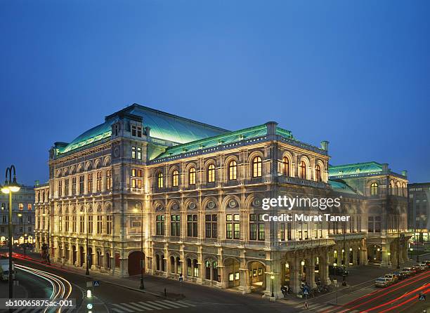 austria, vienna, opera building illuminated - burgtheater wien stock pictures, royalty-free photos & images